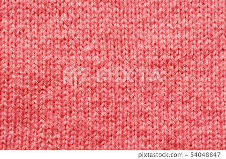 Pink knitted background Pink knitted background 54048847