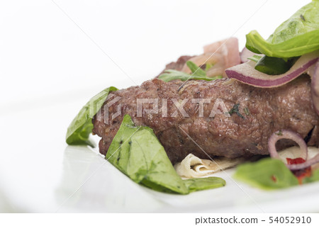 Traditional delicious caucasian shish kebab with Traditional delicious caucasian shish kebab with 54052910