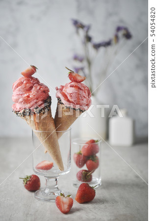 strawberry ice cream and waffle cone strawberry ice cream and waffle cone 54054820
