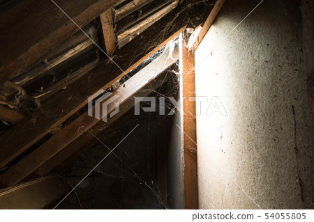 window light in dark old Abandoned Attic window light in dark old Abandoned Attic 54055805