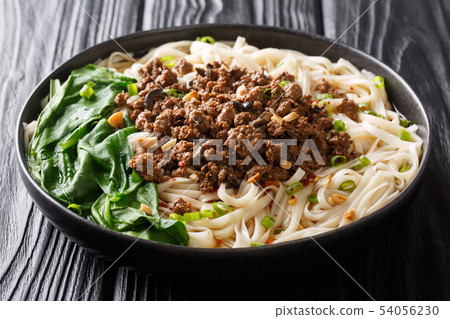 Spicy Dan Dan Noodles with minced meat and herbs Spicy Dan Dan Noodles with minced meat and herbs 54056230