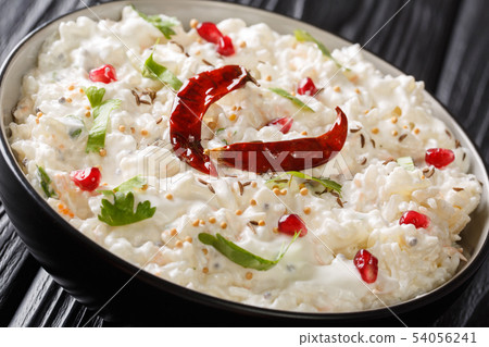 Curd rice or Thayir Sadam is a delicious south 54056241