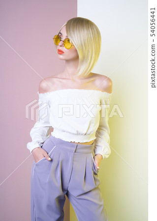 Sensual stylish woman in erotic white dress. 54056441