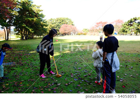 Family playing grand golf 54058055