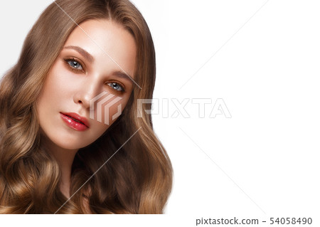 Beautiful fresh girl with perfect skin, curls hair and classic make up. Beauty face. 54058490
