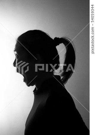 silhouette angry scary portrait of Asia long hair woman in black 54059344