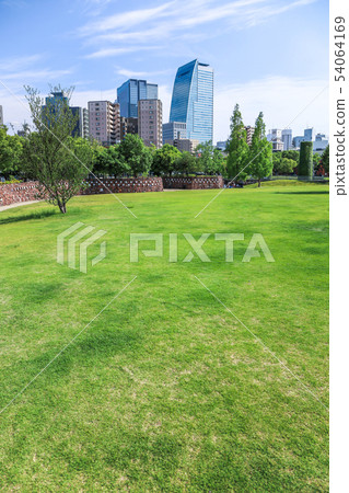 See high-rise buildings over green space open space 54064169
