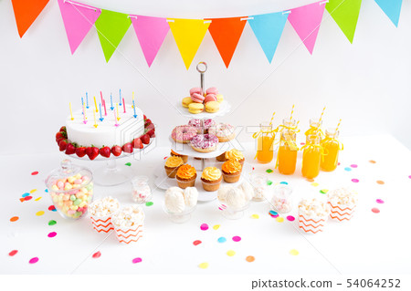 food and drinks on table at birthday party food and drinks on table at birthday party 54064252