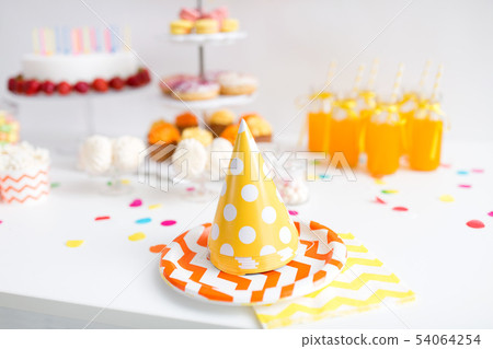 party caps, food and drinks on birthday 54064254