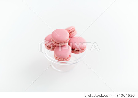 pink macarons on glass confectionery stand pink macarons on glass confectionery stand 54064636