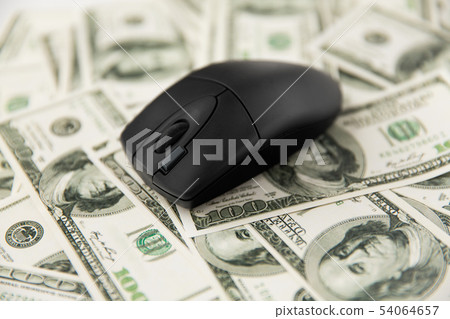 close up of computer mouse on us dollar money close up of computer mouse on us dollar money 54064657