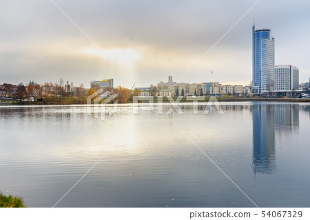 Embankment of Svisloch River in center of Minsk. 54067329