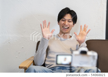 Men shooting a video 54068821