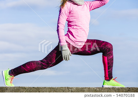 Woman fitness sport girl training outdoor in cold Woman fitness sport girl training outdoor in cold 54070188