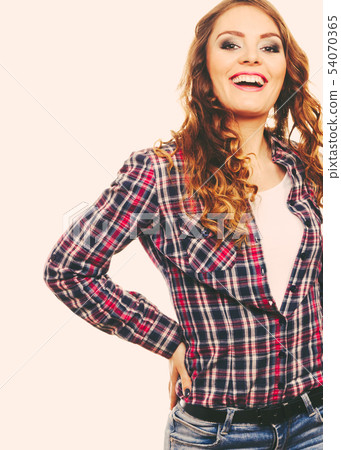 Attractive woman wearing checkered shirt 54070365