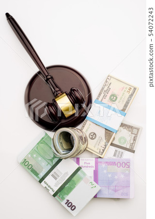 Top view Judge's gavel and packs of dollars and Top view Judge's gavel and packs of dollars and 54072243