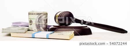 Judge's gavel and packs of dollars and euro Judge's gavel and packs of dollars and euro 54072244