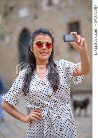 Girl videoblogger or beauty blogger records video Girl videoblogger or beauty blogger records video 54073687