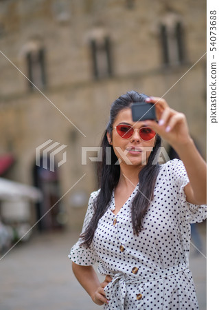 Girl videoblogger or beauty blogger records video Girl videoblogger or beauty blogger records video 54073688