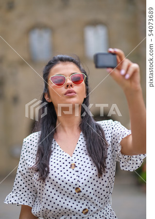 Girl videoblogger or beauty blogger records video Girl videoblogger or beauty blogger records video 54073689