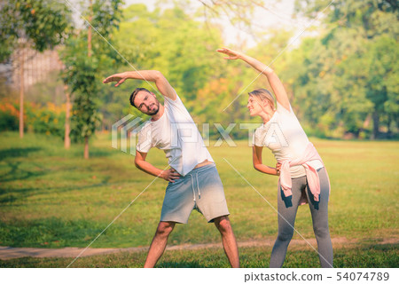 Portrait of Young couple exercise for health in Portrait of Young couple exercise for health in 54074789