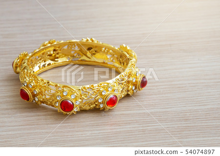 gold bracelet Thai style with red gem stone gold bracelet Thai style with red gem stone 54074897