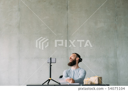 social video blog guy smartphone laughing camera 54075104