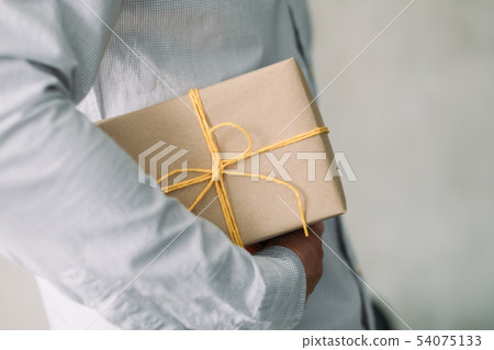 goods delivery service business man wrapped box 54075133