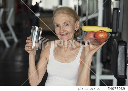 Senior woman eating healthy vegetarian  54077089
