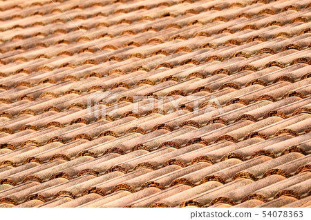 ancient top roof tile pattern of house in rural 54078363