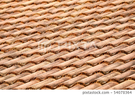 ancient top roof tile pattern of house in rural 54078364
