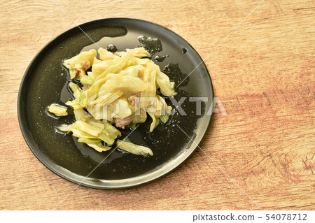 stir fried slice cabbage and pork with fish sauce  54078712
