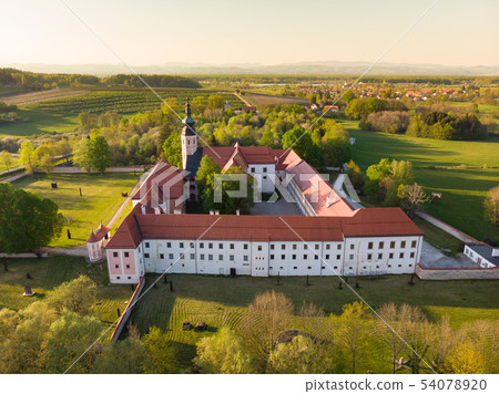 Aerial view of Cistercian monastery Kostanjevica na Krki, homely appointed as Castle Kostanjevica Aerial view of Cistercian monastery Kostanjevica na Krki, homely appointed as Castle Kostanjevica 54078920