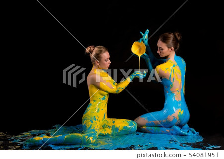 Creative process of naked women pouring paint to body Creative process of naked women pouring paint to body 54081951