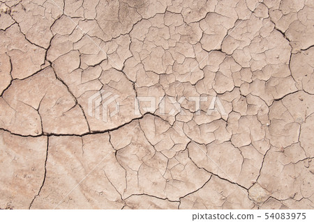 Mud crack,Brown cracked ground texture or 54083975