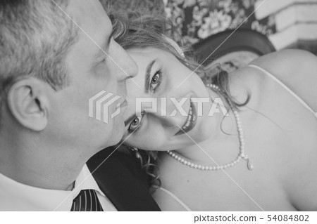 couple in love hugs on white background. man and couple in love hugs on white background. man and 54084802