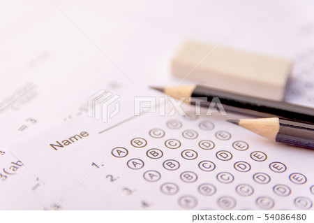 Pencil and eraser on answer sheets or Standardized Pencil and eraser on answer sheets or Standardized 54086480