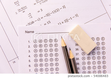 Pencil and eraser on answer sheets or Standardized Pencil and eraser on answer sheets or Standardized 54086483