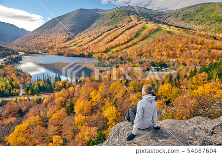 Woman hiking at Artist's Bluff in autumn Woman hiking at Artist's Bluff in autumn 54087604