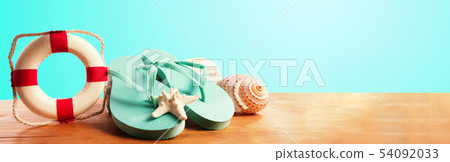 Flip flops on blue background 54092033