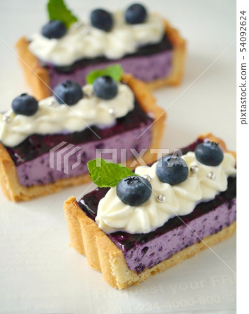 Blueberry rare cheese tart cut 54092624