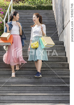 Two women enjoying shopping 54092746
