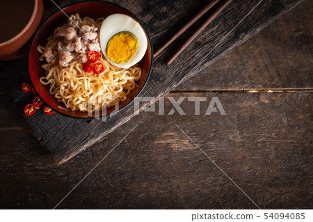 Instant noodle with pork, egg and vegetables on Instant noodle with pork, egg and vegetables on 54094085