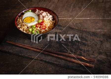 Instant noodle with pork, egg and vegetables on Instant noodle with pork, egg and vegetables on 54094086