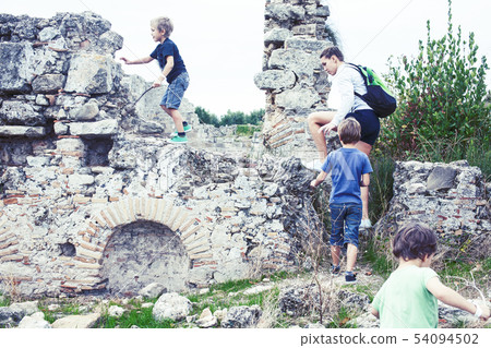 mother with little sons on vacation visiting ancient colosseum, summer tourism, lifestyle people mother with little sons on vacation visiting ancient colosseum, summer tourism, lifestyle people 54094502