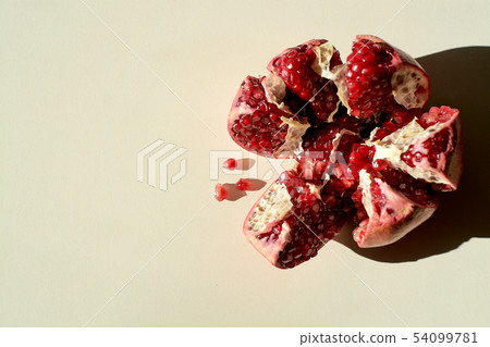 Ripe red juicy pomegranate. Grains pomegranate Ripe red juicy pomegranate. Grains pomegranate 54099781