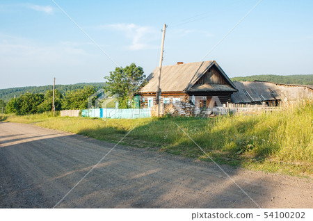 dirt road in a russian village 54100202