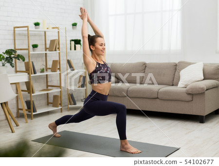 Sporty Woman Practicing Yoga, Doing Stretching Exercise 54102677