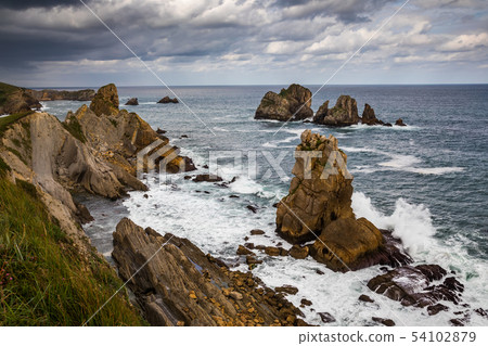 Dramatic view of Playa de la Arnia, Cantabria, Spain. Dramatic view of Playa de la Arnia, Cantabria, Spain. 54102879