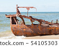 An old rusty ship 54105303